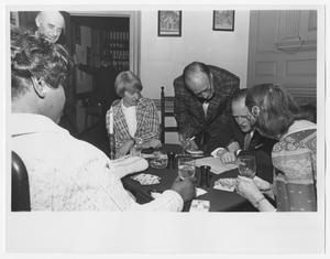 [Barbara Jordan, Nancy Earl, and Two Unidenified Persons Play a Card Game]
