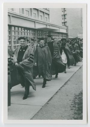 [Barbara Jordan and Other Graduates Walk at Graduation]