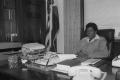 Primary view of [Barbara Jordan Sitting at Her Desk]