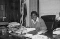 Primary view of [Barbara Jordan Sitting at Her Desk]
