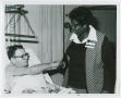 Thumbnail image of item number 1 in: '[Barbara Jordan Shakes Hands with a Patient of Houston Veterans Administration Hospital]'.