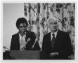 Primary view of [Barbara Jordan With a Man at a Podium]