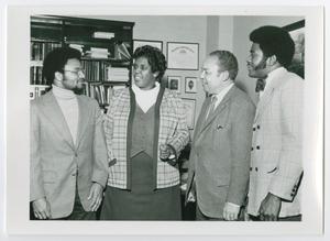 [Marvin Cannon, Barbara Jordan, Harold N. Stinson, and Samuel Brown Meeting in an Office]