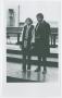 Photograph: [Barbara Jordan Standing With a Student]