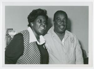 Primary view of object titled '[Barbara Jordan Poses with a Patient of the Houston Veterans Administration Hospital]'.