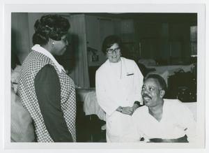 [Barbara Jordan with a Patient and a Staff Member]