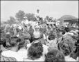 Photograph: [Robert Horton Surrounded by Large Crowd]
