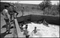 Photograph: [Teenage Boys Swimming in Water Ditch]