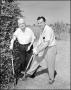 Photograph: [Photograph of Judge Allred and Man Gardening]