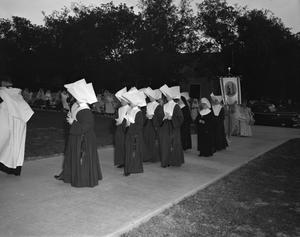 [Nuns Walking at a May Day Procession at Seton Hospital]