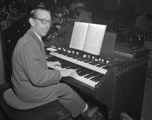 [Portrait of Ralph Kies Sitting at an Organ]