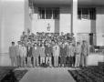 Primary view of [Group Portrait of Men Standing Outside the Beta House]