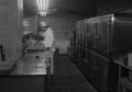 Primary view of [Chef Cooking in the Commodore Perry Hotel Kitchen]