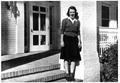 Thumbnail image of item number 1 in: '[Mary Jones on the front steps of the Pi Beta Phi Sorority House]'.