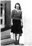 Thumbnail image of item number 1 in: '[Mary Jones on the front steps of the Pi Beta Phi Sorority House]'.