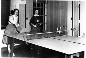 [Renee Rowan Block and Mary Rhydonia Jones playing table tennis]