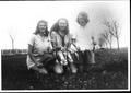 Primary view of [Helen Jane Farmer, Virginia Davis Scarborough, and Mary Jones Prowell with fish]