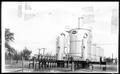 Photograph: [Photograph of oil storage tanks]