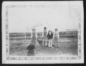 [Frankie Jodarski and three other children, in a pasture at George Ranch]