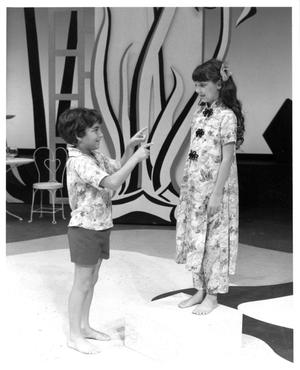 Primary view of object titled '[Ngona and Jerome Play a Game Together in South Pacific Musical]'.
