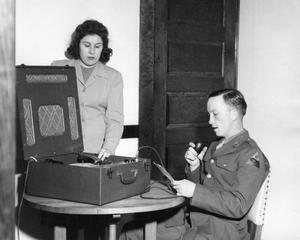 Primary view of object titled '[Soldier Recording a Record]'.