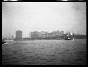Primary view of object titled '[Photograph of Industrial City Area and Water]'.
