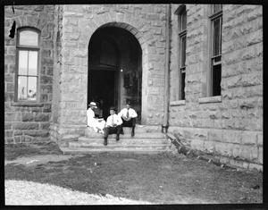 Primary view of object titled '[Three Students Outside Old Main]'.