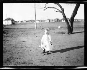 [Photograph of Small Child with Doll]