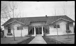 [Photograph of House with Lattice-work]