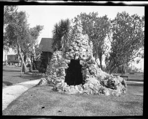 Primary view of object titled '[Photograph of Outdoor Stone Oven]'.