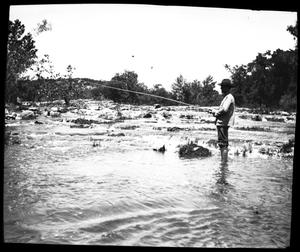 [Photograph of Man Fishing Near Falls]
