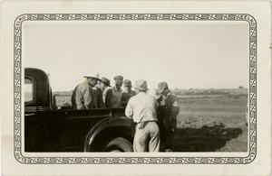 Primary view of object titled '[Workmen in Back of Pickup Truck]'.