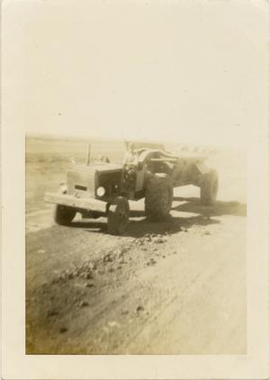 [Tractor Pulling Dirt-Hauling Trailer #2]