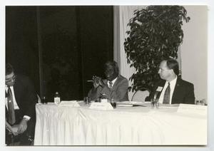 Primary view of object titled '[Photograph of Kevin Brady on Panel with Other Men]'.