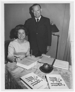 Primary view of object titled '[Photograph of Lady Bird Johnson Signing Books]'.