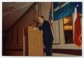 Thumbnail image of item number 1 in: '[Photograph of Dr. Duane M. Leach Speaking]'.