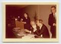 Photograph: [Photograph of Group of People Onstage at Conference]
