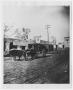 Photograph: [El Paso Street Scene with Carriage and Steer]
