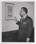 Photograph: [Photograph of John Ben Shepperd Looking at Picture]
