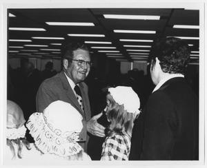 [Photograph of Governor Dolph Briscoe Meeting Children]