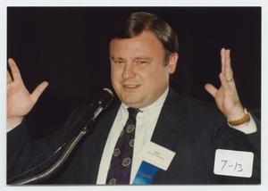 [Photograph of Dr. Ray Perryman Gesturing With Hands]