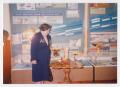 Thumbnail image of item number 1 in: '[A "Night Witch" Standing Next to a Table With a Decoration]'.