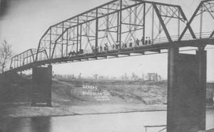 [People standing on Brazos River Bridge in Rosenberg, Texas]