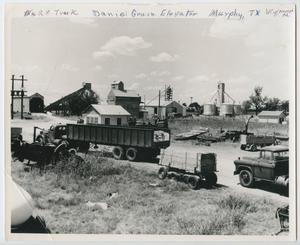 Primary view of object titled '[Photograph of Max and W. O. Daniel Grain Elevator]'.