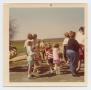 Photograph: [Photograph of Children and Parents at Easter Egg Hunt]