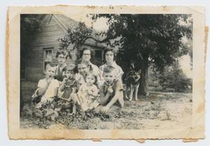 Primary view of object titled '[Photograph of Group of Children and Teenagers in Yard]'.