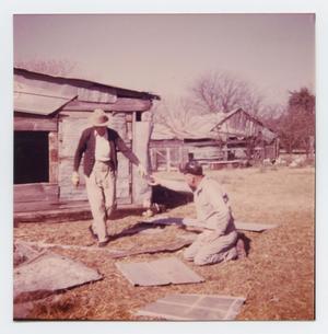 Primary view of object titled '[Photograph of Mr. Turney and Otto Haker Working on Barn]'.