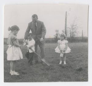[Photograph of Pastor Ritzinger and Children at Ground-Breaking]