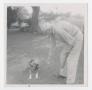 Photograph: [Photograph of Lee Turney With Dog]