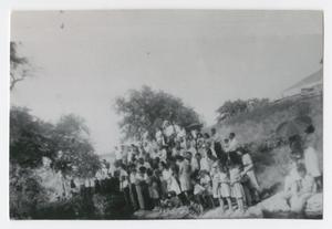 [Photograph of Church Members Standing on Creek Bank]